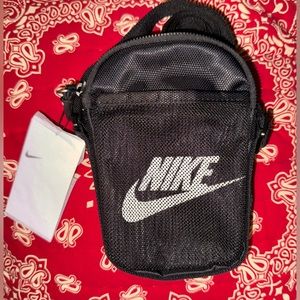 Nike crossbody small pouch in black w white logo on front